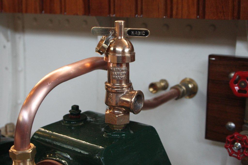 Condensor met kranenbord